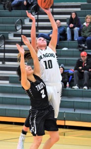 Sophomore Maddie Novak, No. 10, shoots the ball for a basket in Lake Orion’s win over Troy High School. Photo by Jim Newell