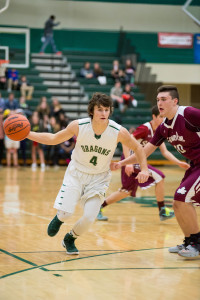 Junior forward Casey Stironek charges up the court . Photo by Nick Weise