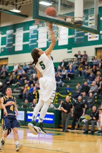 Lake Orion guard Jamie Lewis, no. 5, goes up to the basket during one of the Dragons’ games last week. Photo by Nick Weise