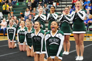 The Lady Dragons do their best to pump up the crowd during competition.Photo by Dan Shriner.