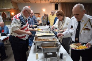 The Knights of Columbus, veterans and family enjoyed a meal of soup, red potatoes, shrimp alfredo, bread, vegetables, roasted pork and dessert. 
