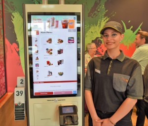 The new McDonald's features four touch screen ordering kiosks. 