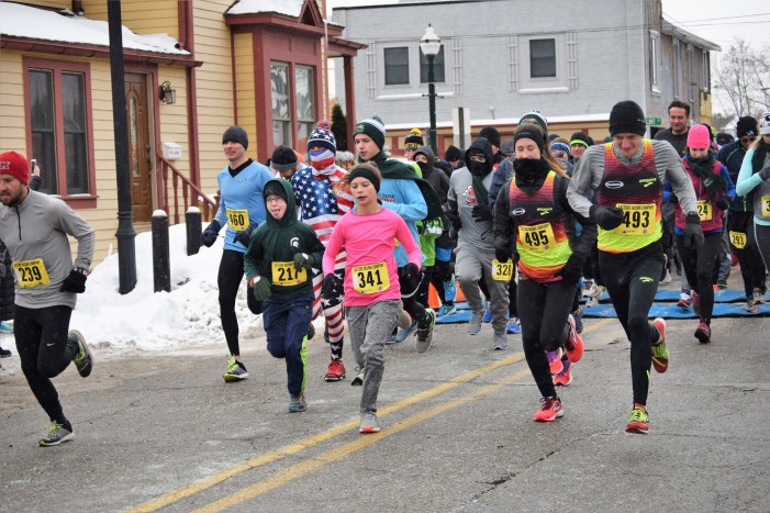 Runners brave frigid temps this New Year’s during DDAs’ annual Resolution Run