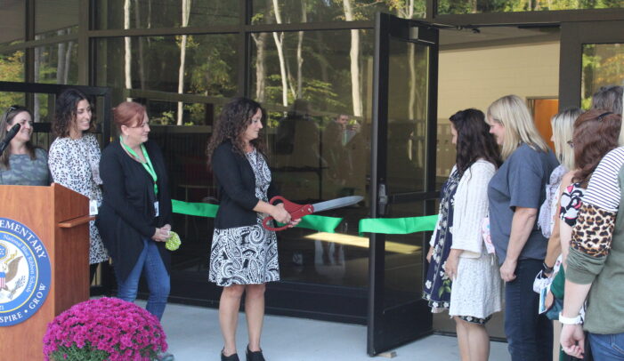 Lake Orion administrators, staff hold ribbon cutting ceremony to celebrate renovations, new additions to 70-plus year old building