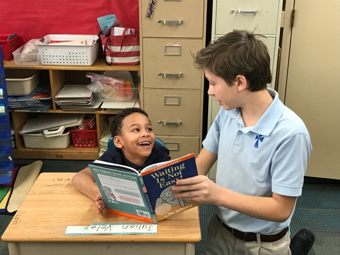 St. Joseph middle schoolers share love of books with elementary students in Pontiac