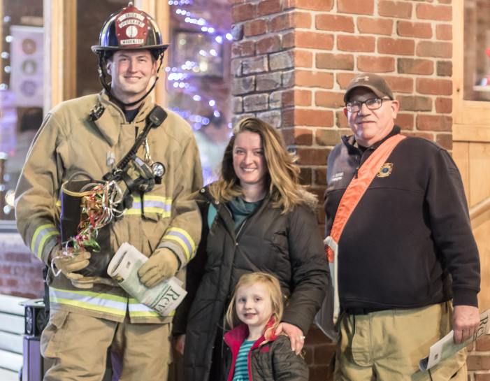 Orion Twp. Fire Dept. Goodfellows sell The Review to support area families