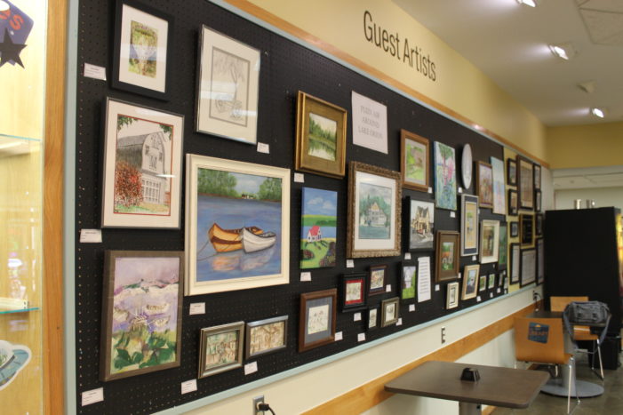 Local art class named July’s guest artists at Orion Twp. Public Library, with paintings of Lake Orion landmarks