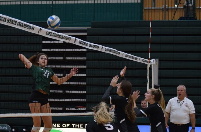 Varsity volleyball begins league play with big win against Troy