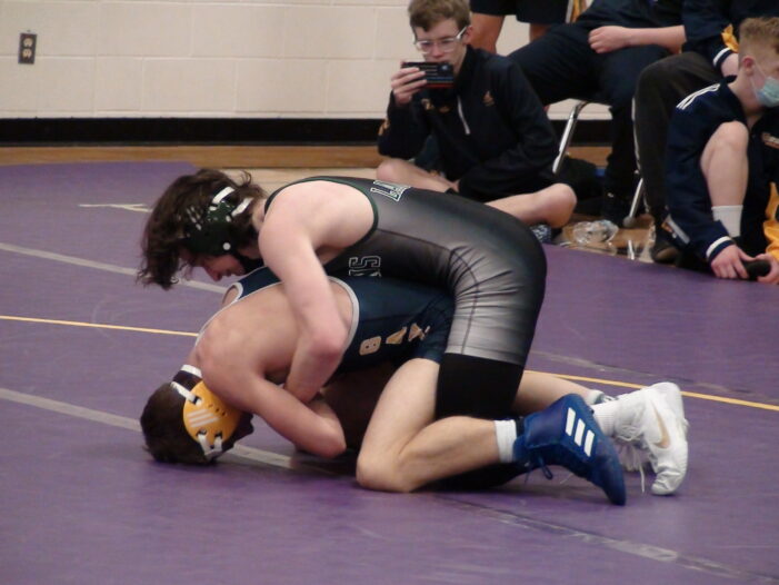 Dragon wrestlers split in league and non-conference meets