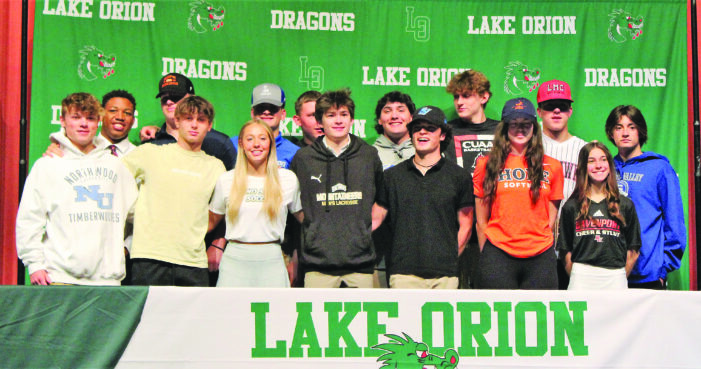 Fourteen Lake Orion High School student athletes sign to play college sports