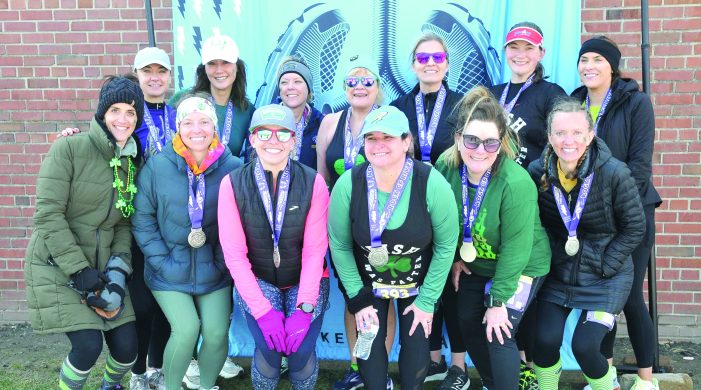 Oxford’s She Runs This Town running group competes in half marathon in Metro Detroit
