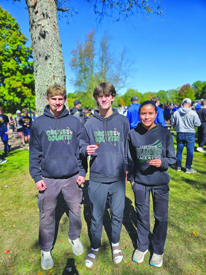 Dragon cross country runners medal at Oakland County meet