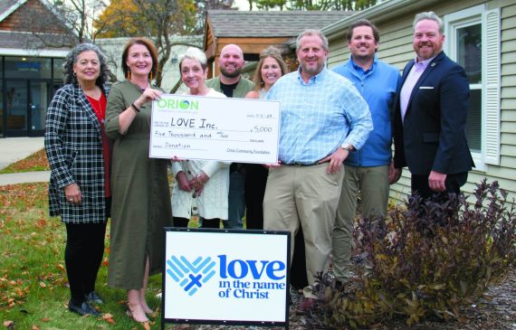 Orion Community Foundation presents $5,000 to Love Inc.