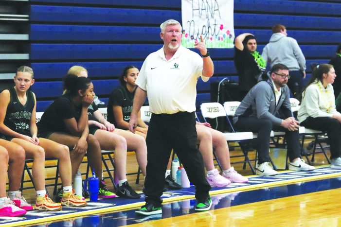 Girls basketball coach Bob Brydges reaches 100 varsity wins